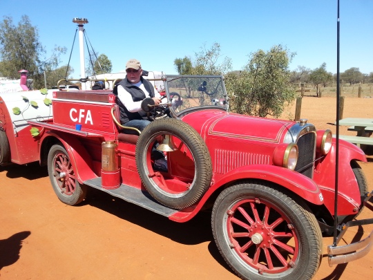 At a rest stop today, Geoff befriended an old chap of 81 and his son who were driving this 1926 Dodge fire engine as part of a veterans rally. Here is Geoff invited to sit in the driver's seat!