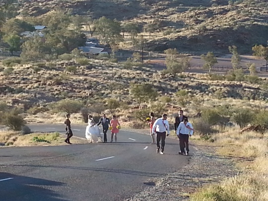 When we arrived at the memorial, there was a wedding party having their photos taken. I captured them walking back up the hill to their lovely hire car sitting at the top of the mountain/hill.