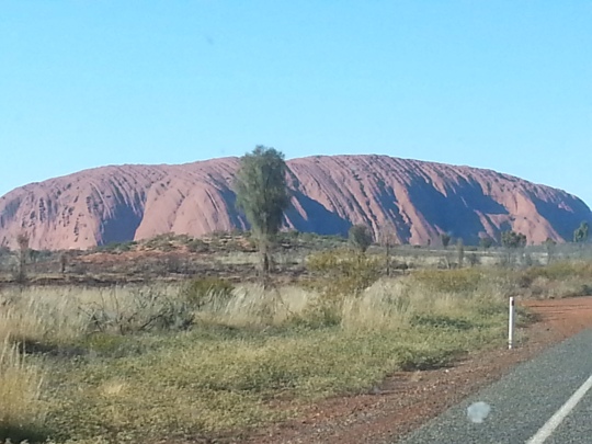 Uluru in the distance as we drover ever closer.