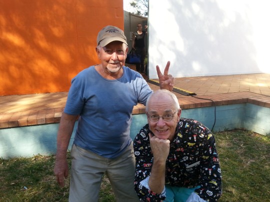 Geoff doing the bunny ears with Dr. Karl 