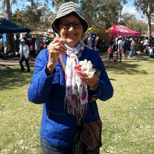 This is me enjoying fresh strawberries, cream and ice-cream at the Festival on the banks of the dry river.